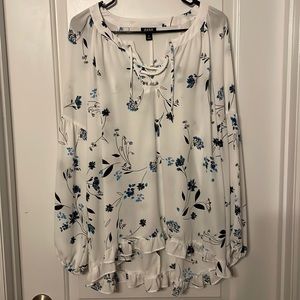 Ana blue floral blouse with neck string tie.